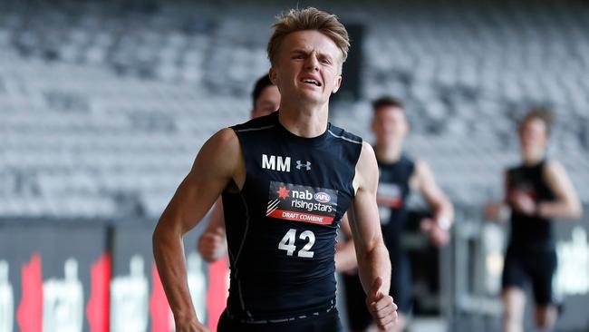 Norwood’s Jacob Kennerley powers to the line to win the 2km time trial in record fashion. Picture: Michael Willson (AFL Media/Getty Images)