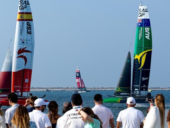 Spain SailGP Team helmed by Diego Botin leads Australia SailGP Team helmed by interim driver Jimmy Spithill on Race Day 1 of the Emirates Sail Grand Prix presented by P&O Marinas in Dubai, United Arab Emirates. 9th December 2023. Photo: Kieran Cleeves for SailGP. Handout image supplied by SailGP