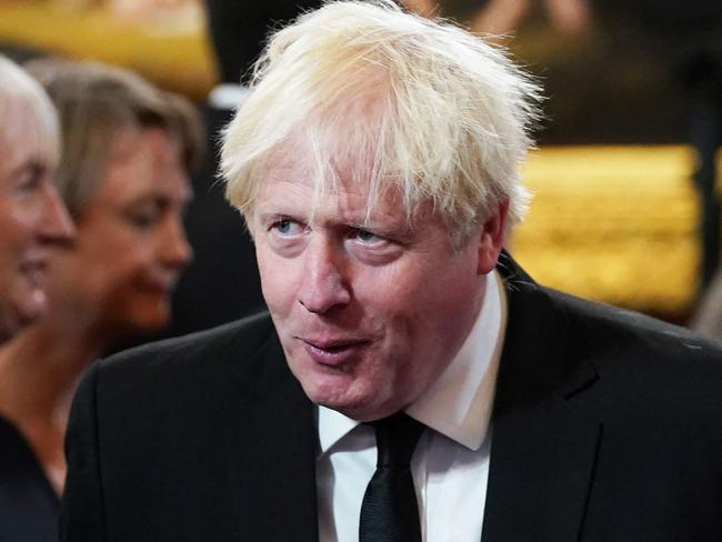 Former prime minister Boris Johnson (R) attends a meeting of the Accession Council inside St James's Palace in London on September 10, 2022, to proclaim Britain's King Charles III as the new King. - Britain's Charles III was officially proclaimed King in a ceremony on Saturday, a day after he vowed in his first speech to mourning subjects that he would emulate his "darling mama", Queen Elizabeth II who died on September 8. (Photo by Kirsty O'Connor / POOL / AFP)