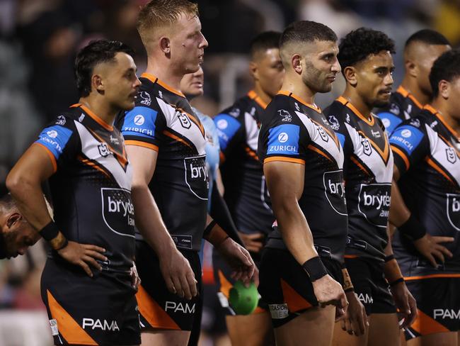 WOLLONGONG, AUSTRALIA - JUNE 07: Wests Tigers players look on after a Dragons try during the round 14 NRL match between St George Illawarra Dragons and Wests Tigers at WIN Stadium on June 07, 2024, in Wollongong, Australia. (Photo by Jason McCawley/Getty Images)