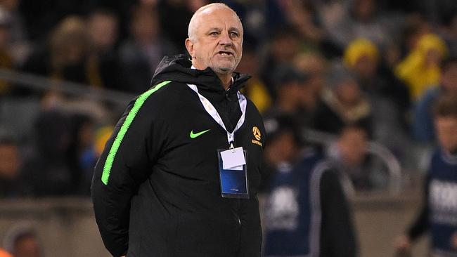 Graham Arnold wants to plan a way through a fixture logjam. Photo: AAP Image/James Gourley