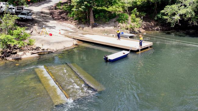 A big section of the permanent concrete Fisheries Bridge causeway was washed away by severe flooding after Cyclone Jasper Picture: Brendan Radke