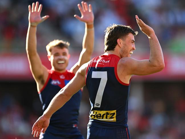 GOLD COAST, AUSTRALIA - AUGUST 17: Jack Viney of the Demons celebrates with team mates after kicking a goal during the round 23 AFL match between Gold Coast Suns and Melbourne Demons at People First Stadium, on August 17, 2024, in Gold Coast, Australia. (Photo by Albert Perez/AFL Photos via Getty Images)