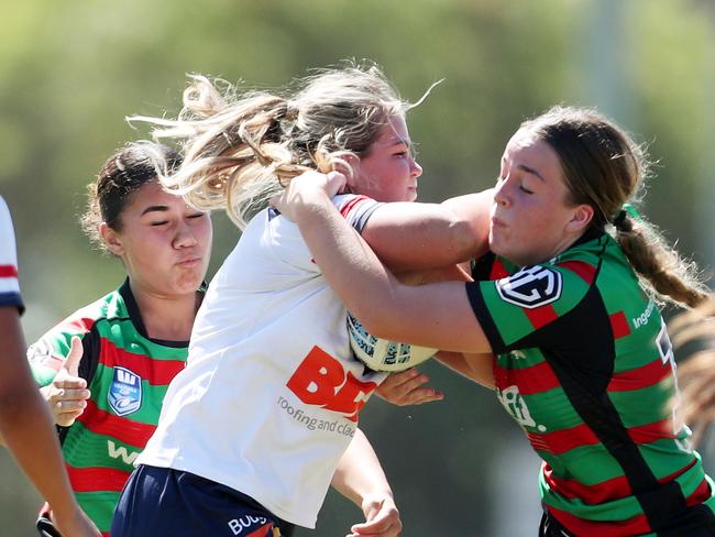 Emily-Rose Hall is tackled by Claudia Nairn. Picture: Sue Graham