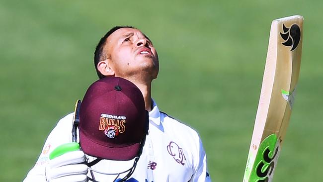 Usman Khawaja of the Queensland Bulls celebrates bringing up his century during day three of the Sheffield Shield match between South Australia and Queensland at Adelaide Oval, on October 17, 2021. (Photo by Mark Brake/Getty Images)