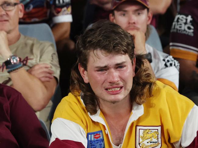 DAILY TELEGRAPH OCTOBER 1, 2023NRL Telstra Premiership Grand Final at Accor Stadium between Penrith Panthers and Brisbane Broncos. Penrith wins 26-24 with a late try by Nathan Cleary. A dejected Brisbane fan sheds a few tears. Picture: David Swift