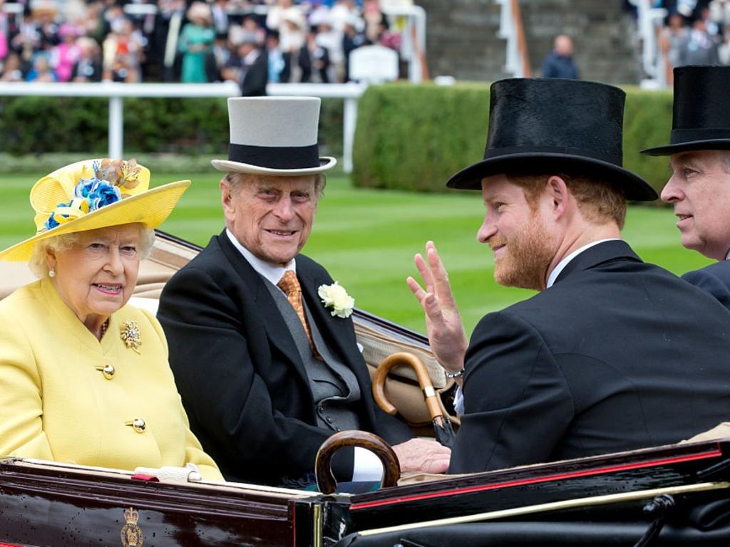 Queen Elizabeth II, and Prince Philip, the Duke of Edinburgh, with Prince Harry, and Prince Andrew, Duke of York, in happier times at Royal Ascot. Picture: Getty Images