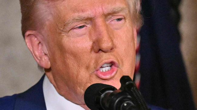 US President Donald Trump takes a question as he speaks during the signing of executive orders at his Mar-a-Lago resort in Palm Beach, Florida, on February 18, 2025. Trump signed an executive order February 18 aimed at improving the affordability and availability of in vitro fertilization, a health issue he had addressed on the campaign trail. (Photo by ROBERTO SCHMIDT / AFP)