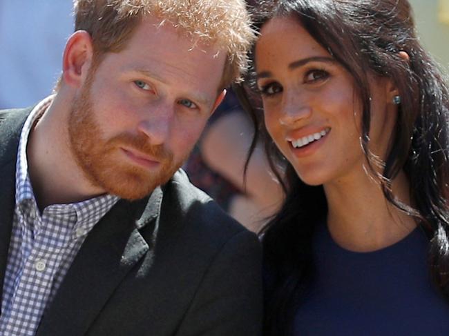 SYDNEY, AUSTRALIA - OCTOBER 19: Prince Harry, Duke of Sussex and Meghan, Duchess of Sussex watch a performance during their visit to Macarthur Girls High School on October 19, 2018 in Sydney, Australia. The Duke and Duchess of Sussex are on their official 16-day Autumn tour visiting cities in Australia, Fiji, Tonga and New Zealand. (Photo by Phil Noble - Pool/Getty Images)