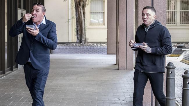 Matthew Samuel Becker and Brandon Thomas Locke-Walker have breakfast before appearing in court. Picture: Monique Harmer