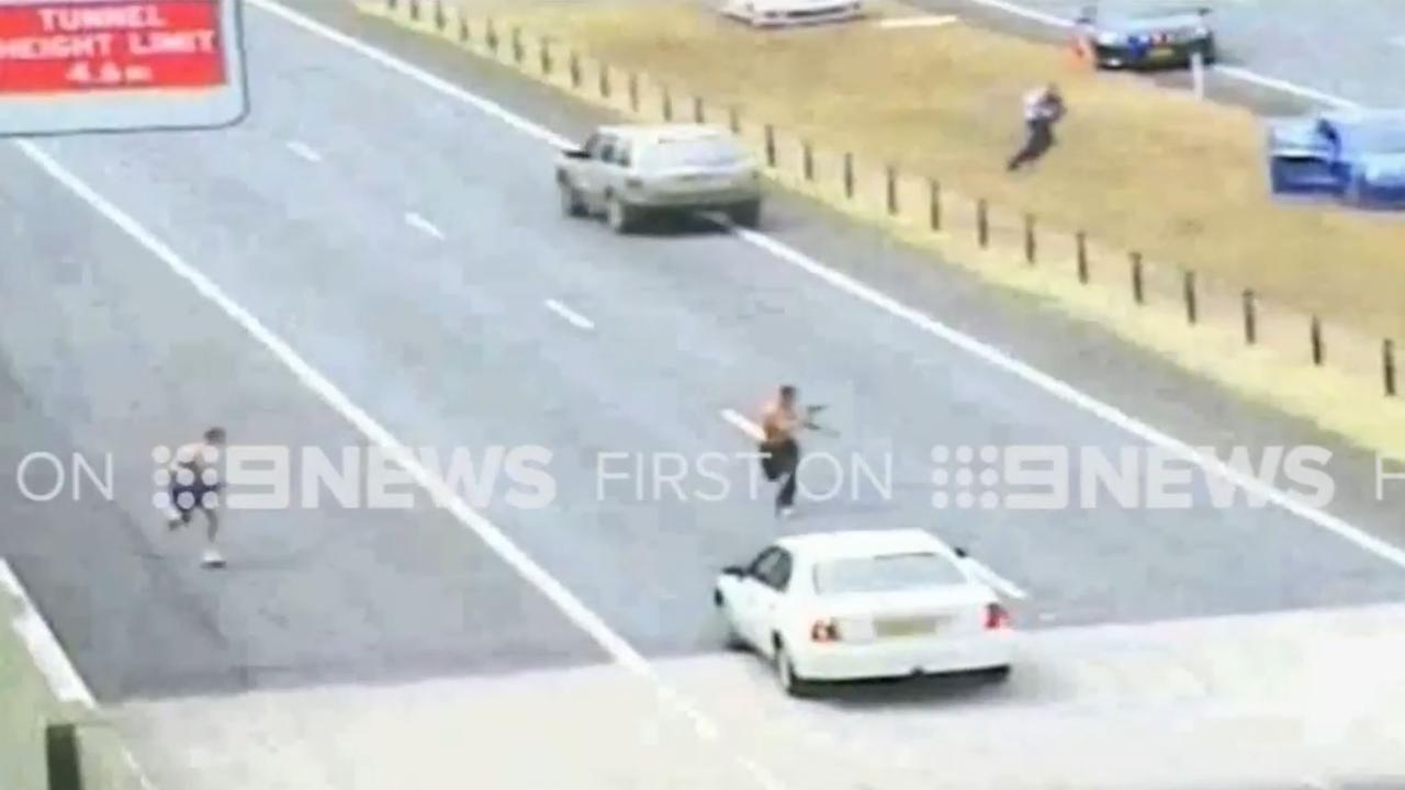 Snr Sgt Bradyn Murphy is shot at by armed offenders on the M1 near the Tugun tunnel in February 2015. Picture: 9News.