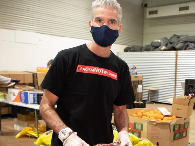 Craig Foster at Addi Road Emergency Food Relief Hub in Marrickville. SecondBite, City of Sydney and Coles have banded together to provide vital food relief to vulnerable Sydney residents by donating and delivering the equivalent of 158,750 meals to individuals and families impacted by COVID-19. PLEASE CREDIT - Pictures - Chris Pavlich Photography