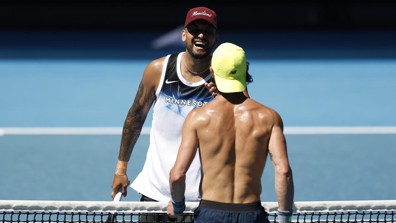 Nick Kyrgios and Jordan Thompson share a laugh during their practice session on Saturday. (Photo by Daniel Pockett/Getty Images)