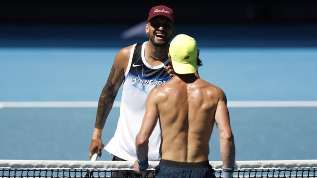 Nick Kyrgios and Jordan Thompson share a laugh during their practice session on Saturday. (Photo by Daniel Pockett/Getty Images)