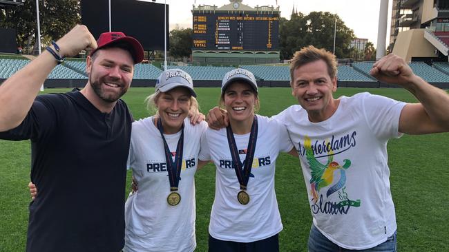 Boyzone's Brian McFadden and Mark Soderstrom with Crows AFLW premiership stars Marijana Rajcic and Chelsea Randall. Picture: Mix 102.3