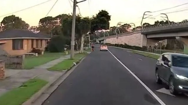 Dashcam footage shows the white car and the 59-year-old Pakenham cyclist on Thursday April 13. Picture: Victoria Police