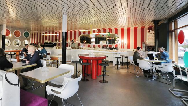 With its chunky, brightly coloured furniture and bold candy stripes behind the barm Smolt Kitchen’s interior has a cool Memphis-style design vibe. Picture: Mathew Farrell