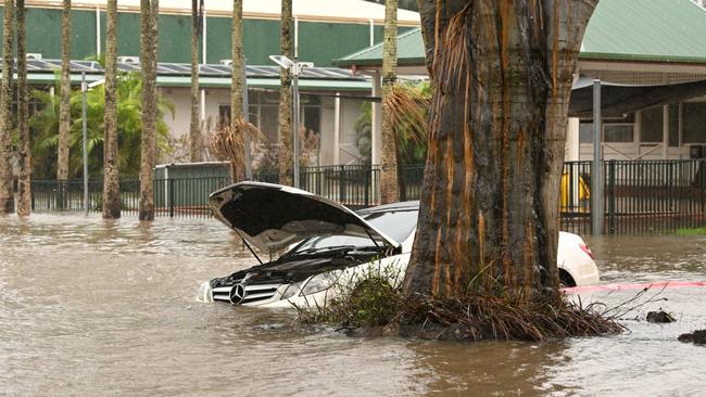 A car is inundated by floodwater in Lismore at the end of March. Picture: Getty Images