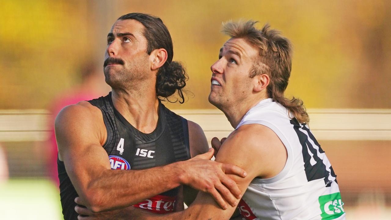 Collingwood’s Brodie Grundy and back-up ruckman Max Lynch compete for the ball during a training duel at the Holden Centre.