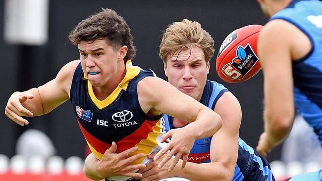 Sturt’s Sam Colqhoun tackles Adelaide’s Ned McHenry. Picture: Tom Huntley