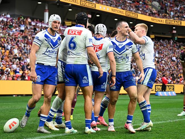 BRISBANE, AUSTRALIA - JULY 27: Bulldogs celebrate a try during the round 21 NRL match between Brisbane Broncos and Canterbury Bulldogs at Suncorp Stadium, on July 27, 2024, in Brisbane, Australia. (Photo by Albert Perez/Getty Images)