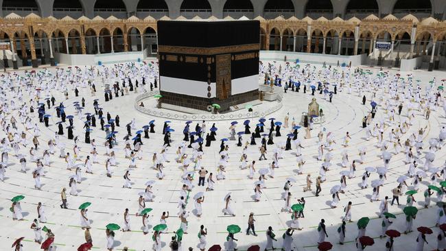 Pilgrims circle the Kaaba, Islam's holiest shrine, at the centre of the Grand Mosque in the holy city of Mecca, at the start of the annual Muslim Haj. Picture: AFP