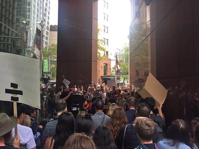 Police controlled the crowd as protesters held signs which said “Sunlies” and held flags. Picture: Twitter / @edinthewater