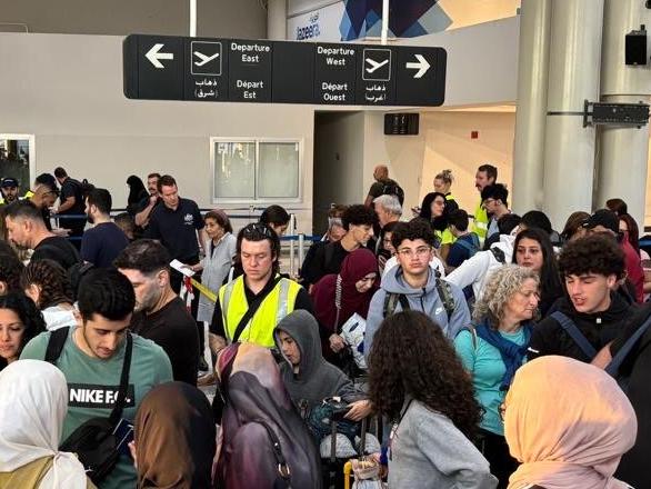 Australian Government officials assisting Australians to depart Lebanon on two government-supported charter flights from Beirut Airport to Larnaca, Cyprus and on to Australia. Picture: NewsWire Handout