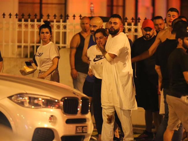 People gather at the scene in Epping where Maghnie was shot. Picture: Wayne Taylor