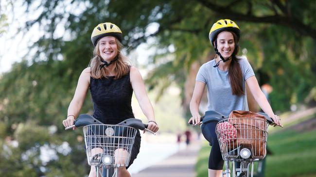 Emma Donaldson and Kathryn Al-Dhafeeri cycling. Picture: AAP/Claudia Baxter