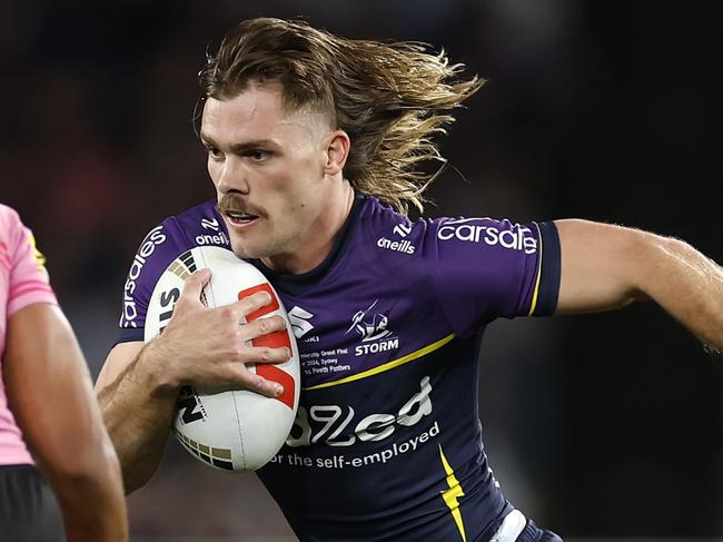 SYDNEY, AUSTRALIA - OCTOBER 06:  Ryan Papenhuyzen of the Storm runs the ball during the 2024 NRL Grand Final match between the Melbourne Storm and the Penrith Panthers at Accor Stadium on October 06, 2024, in Sydney, Australia. (Photo by Cameron Spencer/Getty Images)