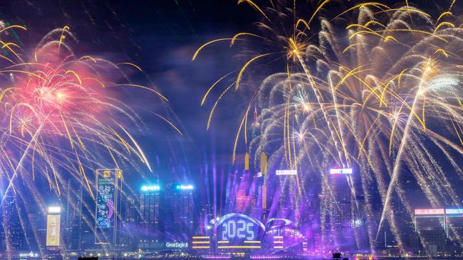 Fireworks light up the midnight sky over Victoria Harbour. Picture: AFP