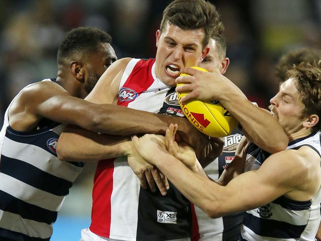 GEELONG, AUSTRALIA - JULY 13: Rowan Marshall of the Saints  is tackled during the round 17 AFL match between the Geelong Cats and the St Kilda Saints at GMHBA Stadium on July 13, 2019 in Geelong, Australia. (Photo by Darrian Traynor/Getty Images)