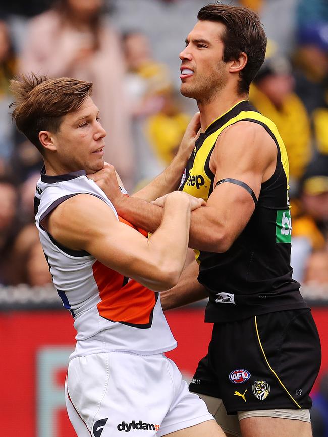 Toby Greene tangles with Alex Rance. Picture: Michael Klein