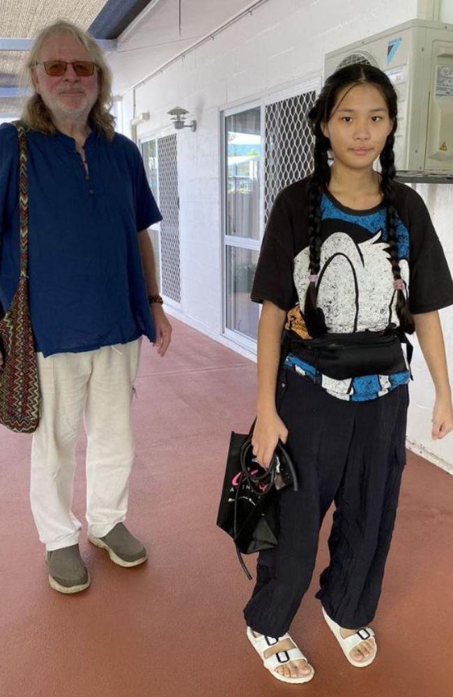 Melody Neal, 18, with her dad Stuart Neal, returning home for the first time from hospital. She was allegedly stabbed at school in May at Peace Lutheran College. Picture: Supplied