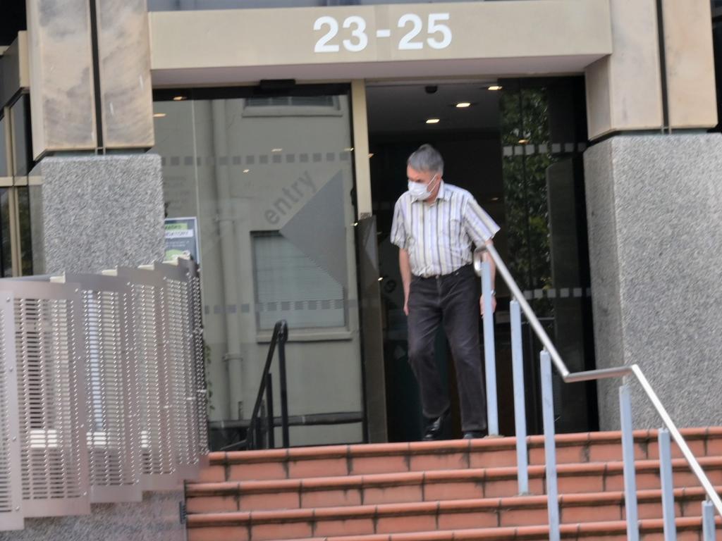 Olaf Vennik leaving the Hobart Magistrates Court after being sentenced for failing an obligation to report a death and unlawfully disposing of human remains. Picture: Kenji Sato.