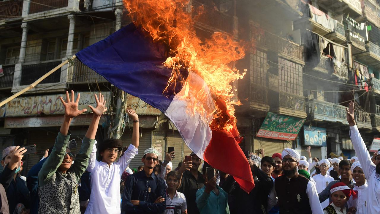 Pakistani Sunni Muslims burn a French flag during a protest in Karachi on October 30, 2020, following French President Emmanuel Macron's comments. Picture: by Asif Hassan / AFP