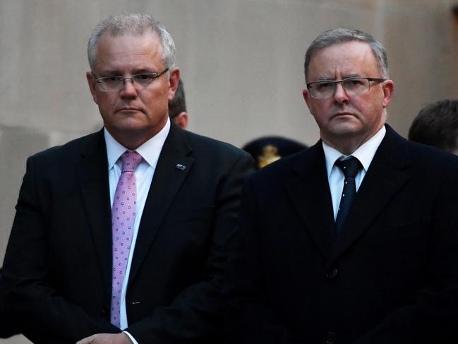 CANBERRA, AUSTRALIA - JULY 01: Prime Minister Scott Morrison and Opposition Leader Anthony Albanese (R) during a special Last Post Ceremony at the Australian War Memorial  on July 01, 2019 in Canberra, Australia. The special ceremony was to mark the opening of the 46th Australian Federal Parliament. Each Last Post Ceremony commemorates the personal story of one of the more than 102,500 Australians whose names are recorded on the Memorial's Roll of Honour, in recognition of the service and sacrifice of all Australians who have died in war and on operational service. (Photo by Tracey Nearmy/Getty Images)