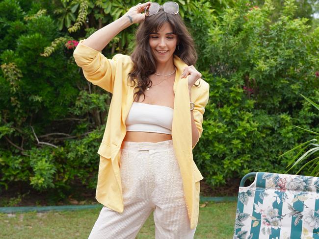 Vintage Esprit pants, Ted Lapidus sunglasses, vintage yellow blazer. Picture: Katrina Lezaic