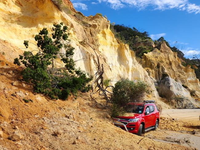 Epic Ocean Adventures Noosa owner Tyron Van Santen says the owners of a car swallowed by a spectacular sand slip at Rainbow Beach were lucky to escape without injury. Pictures: Epic Ocean Adventures Noosa