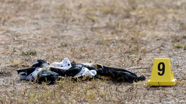 Items of clothing found around Keilor Plains train station. Picture: Andrew Henshaw