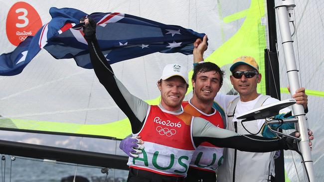 Australia's Nathan Outteridge and Iain Jensen with coach Emmett Lazich after winning silver in the 49er class in Rio.