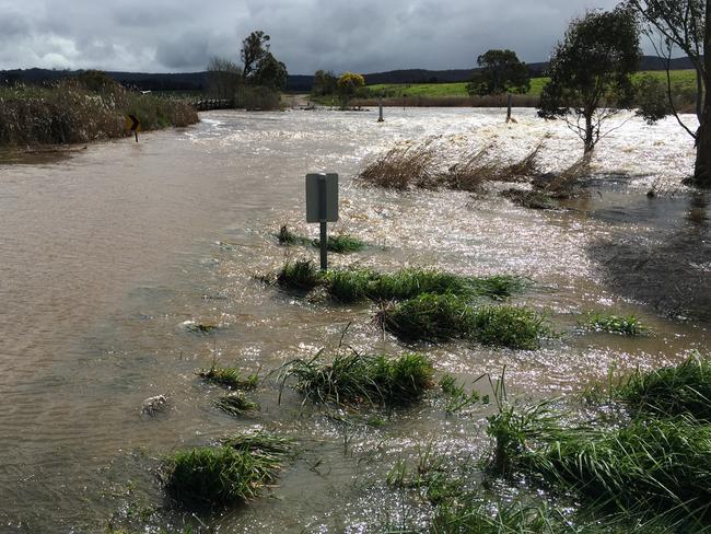 Victoria: Rain floods roads in Lancefield. Picture: Zoe Phillips