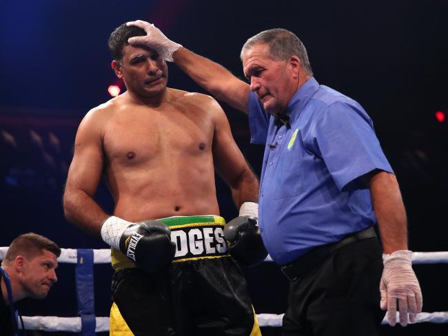 The referee calls the end of the fight after just 23 seconds. Picture: Getty