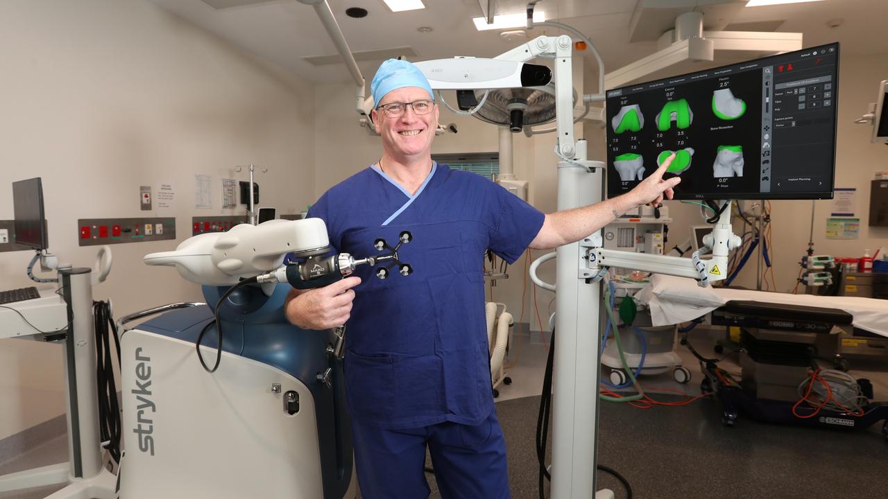 Dr Wainwright with the new robotic platform, set to make surgeries in Mackay even more precise. Picture: Mater