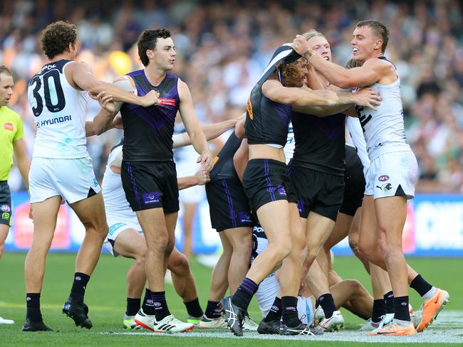 Tempers flared in the second half after Lachie Fogarty’s late hit on Nat Fyfe. Picture: Sarah Reed/AFL Photos