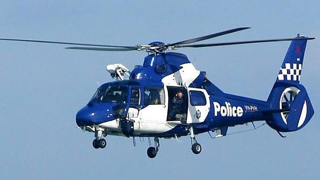 Police are hunting a motorist after a police car was rammed near Castlemaine.