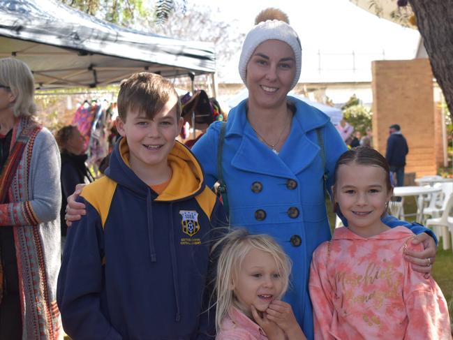 Lincoln, Linda, and Talitha Ridley with little Raleigh Oloman at the Jumpers and Jazz artisan markets on July 17, 2021.