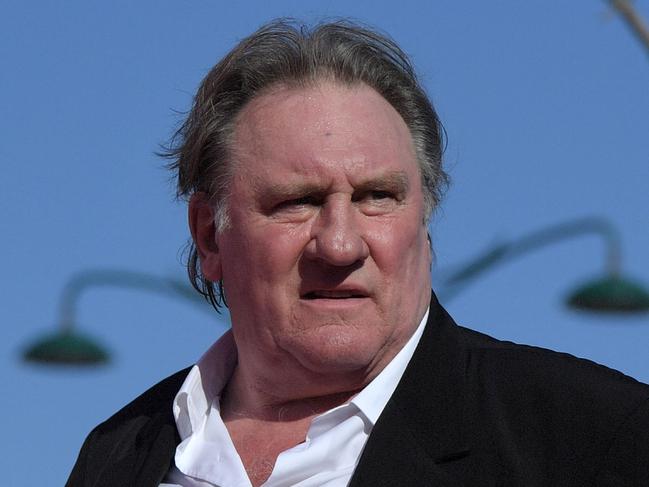 (FILES) French actor Gerard Depardieu arrives for the screening of the restored version of the movie "Novecento - Atto Primo" by Bernardo Bertolucci, presented as part of Venice Classics selection at the 74th Venice Film Festival on September 5, 2017 at Venice Lido. The trial of French film legend Gerard Depardieu, who is charged with rape and is facing a litany of other sexual assault claims, and who trial opens on October 28, has requested an adjournment for health reasons, his lawyer announced on October 28, 2024. (Photo by Tiziana FABI / AFP)