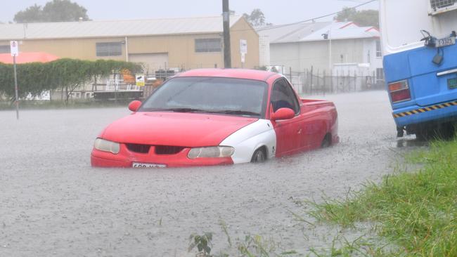 Saturday February 1. Car partly submerged in Camgulia Street, Mt Louisa. Picture: Evan Morgan